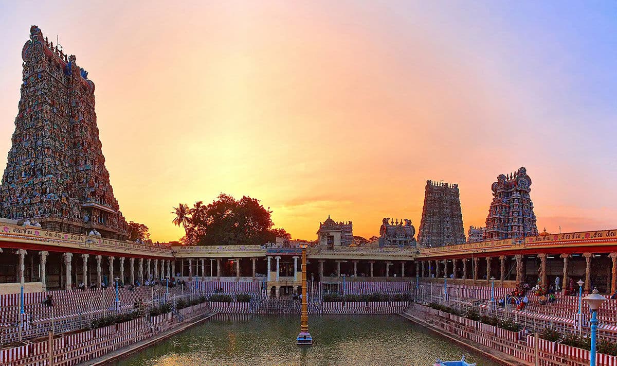The golden lotus tank of the Meenakshi temple at sunset