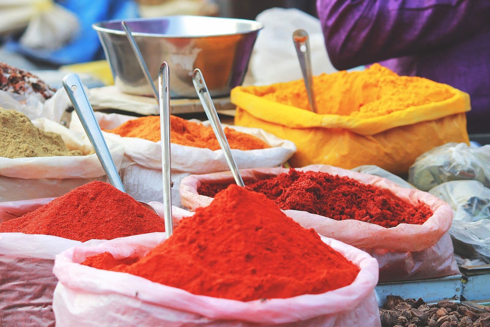 Sacks of turmeric, chilli and spices in an Indian market