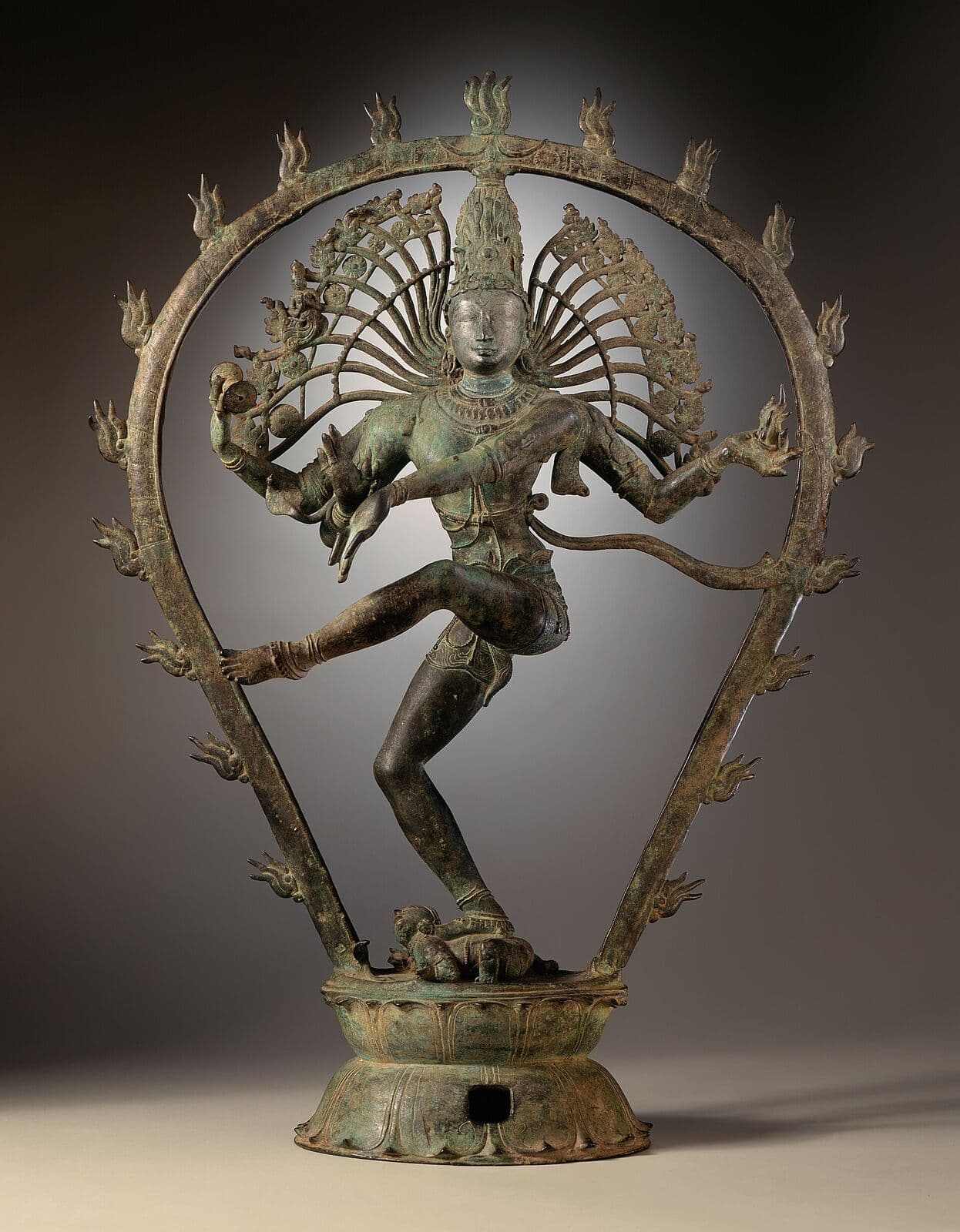 Chola bronze sculpture of Shiva Nataraja within a ring of flames